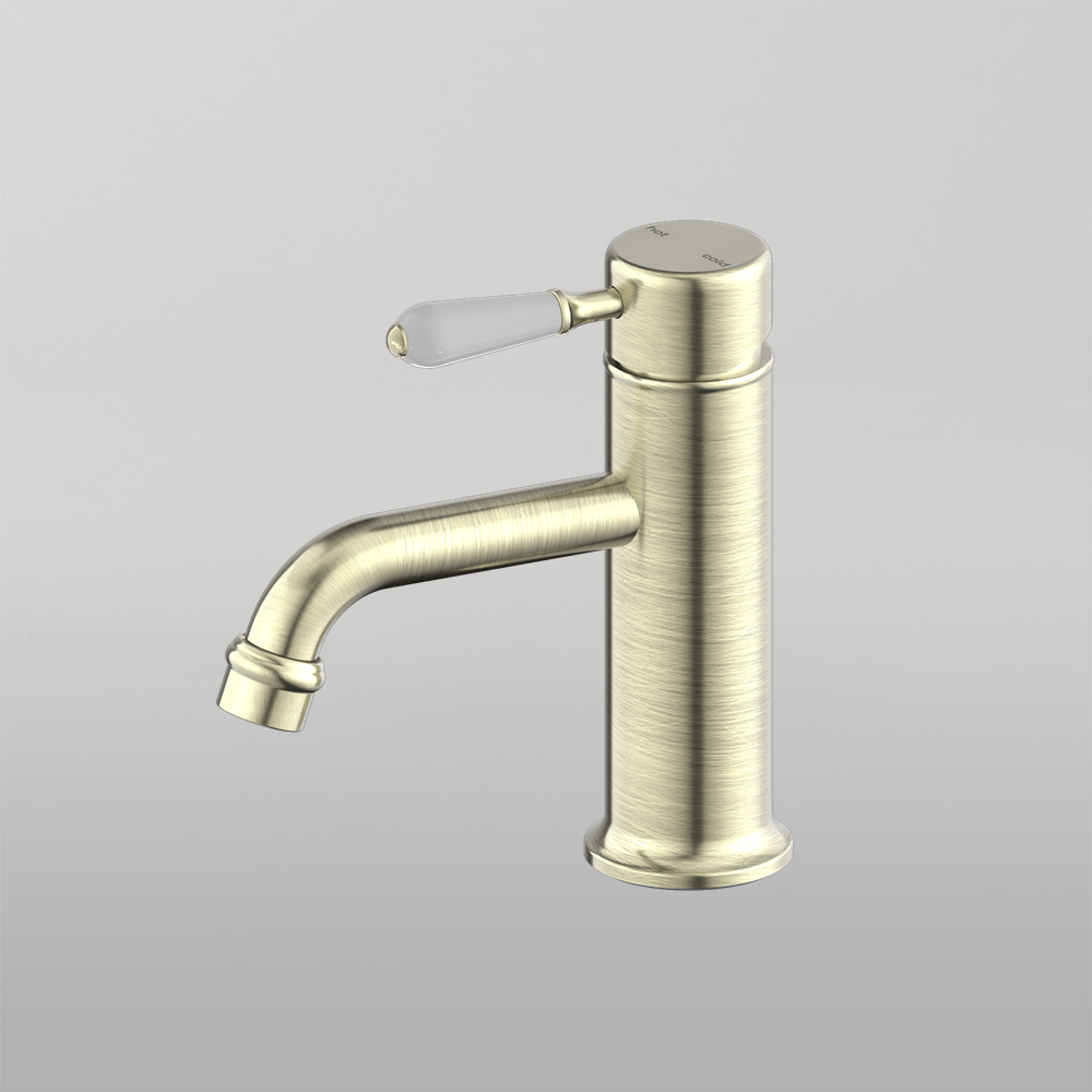 York Straight Basin Mixer With White Porcelain Lever Aged Brass